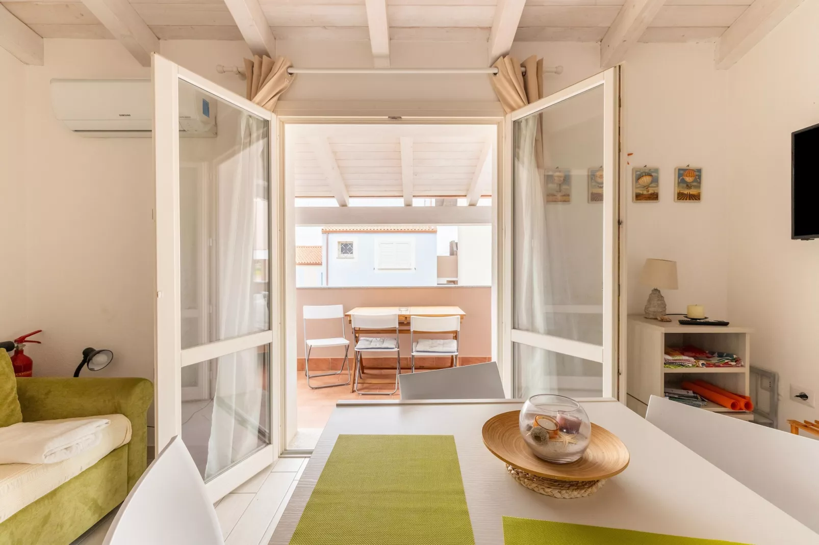 ATTICO BADESI CON PISCINA - Eetkamer