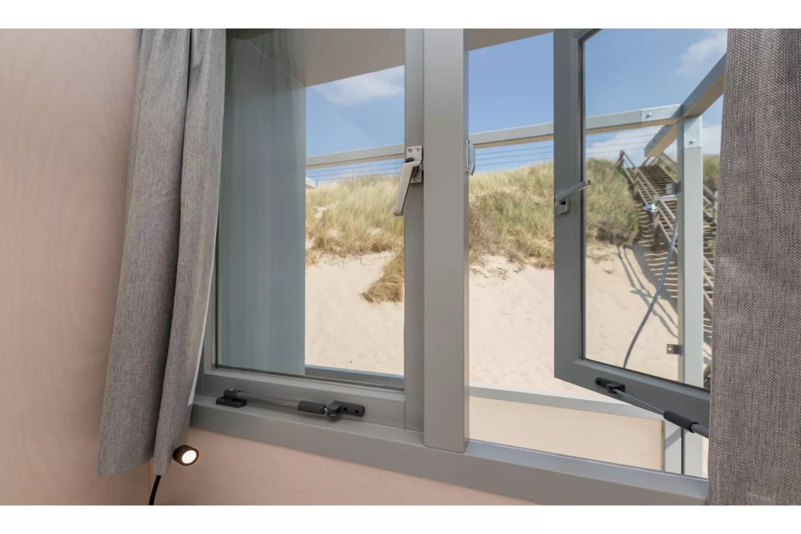 Slaapstrandhuisje - Strand dishoek 67  Dishoek-Uitzicht zomer