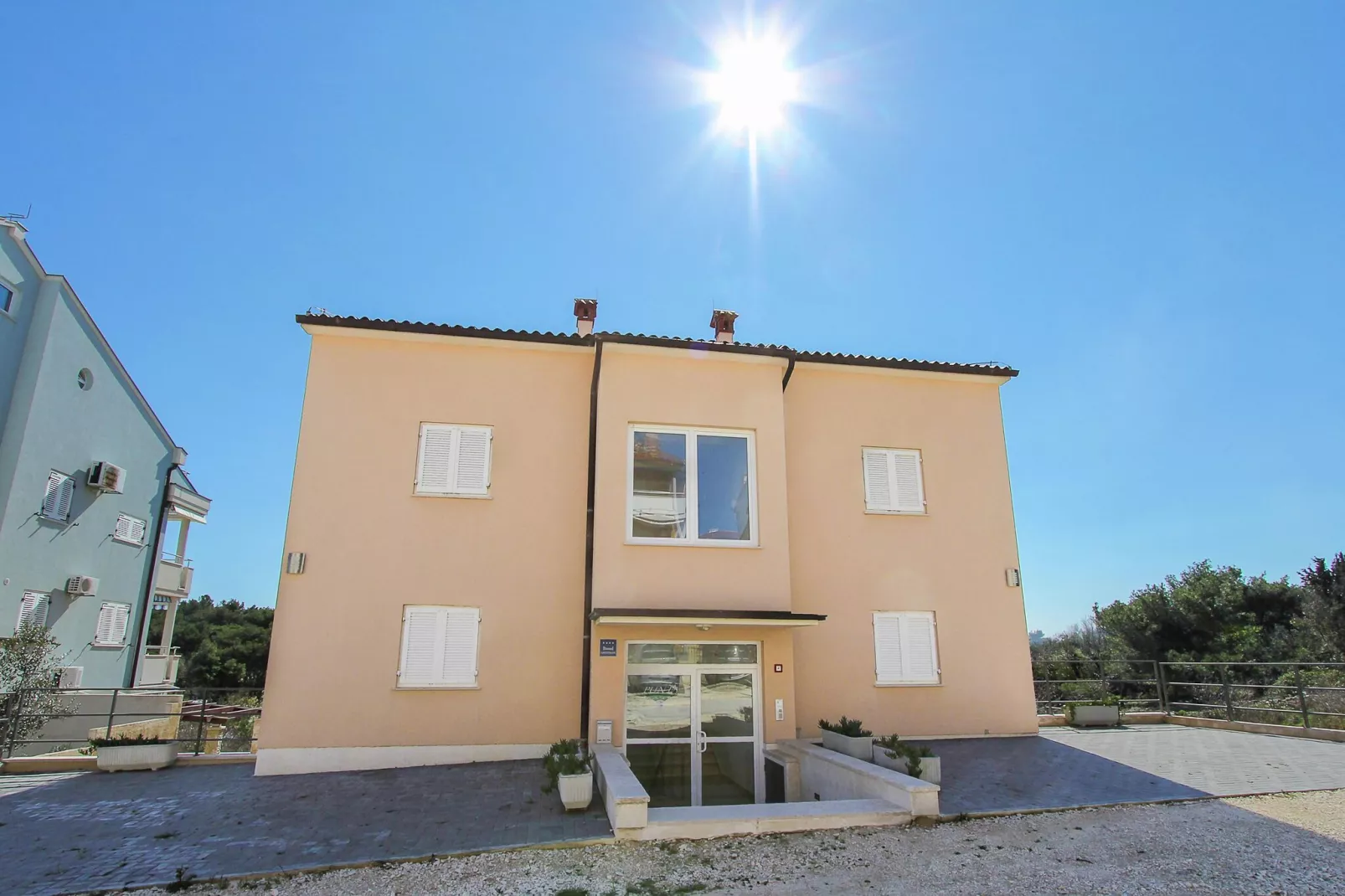 Apartment Punta D-Buitenkant zomer