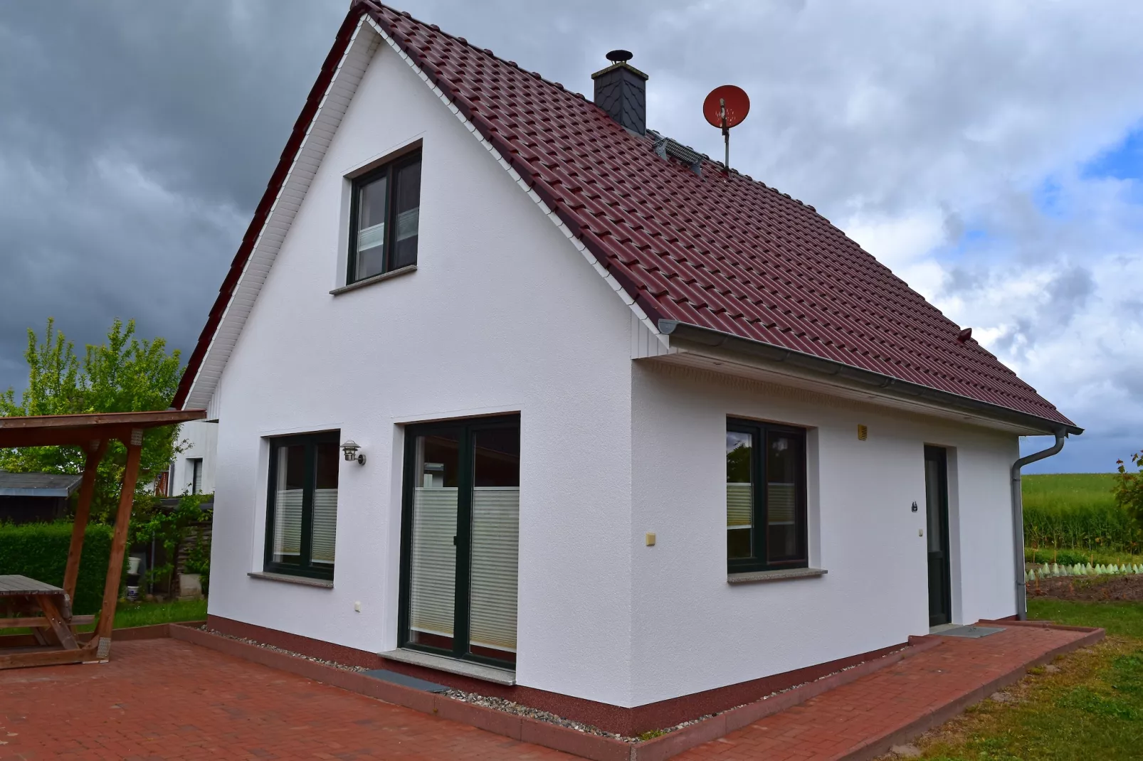 Strandnahes Ferienhaus Walter mit Meerblick - Buitenkant zomer