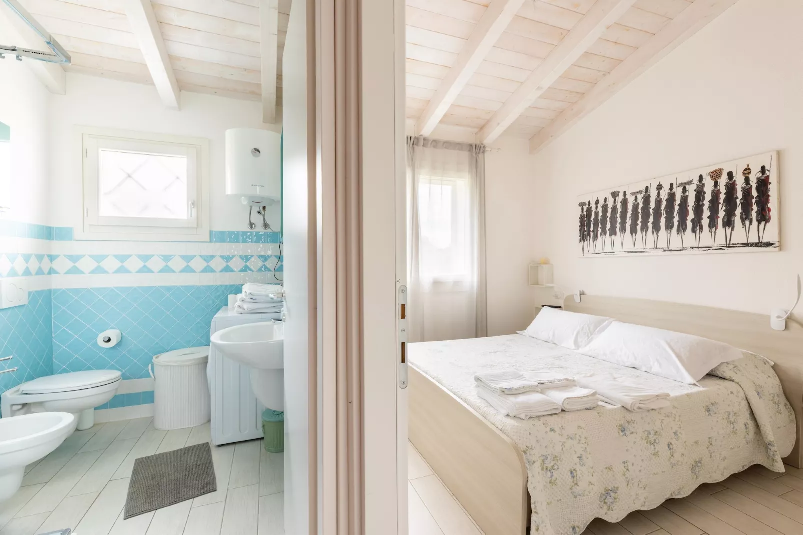 ATTICO BADESI CON PISCINA - Slaapkamer