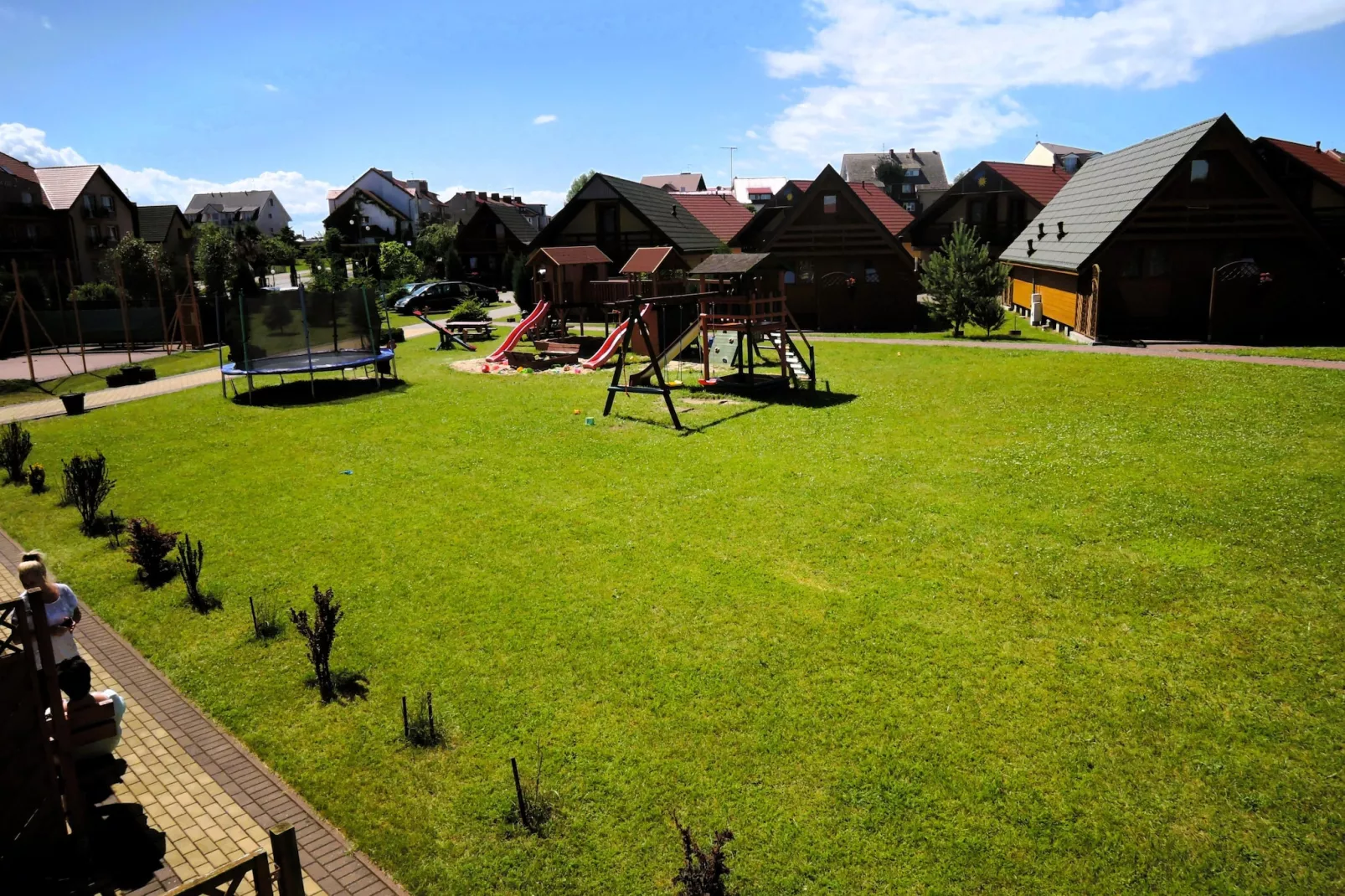 Domki wypoczynkowe - Promyczek - Uitzicht zomer