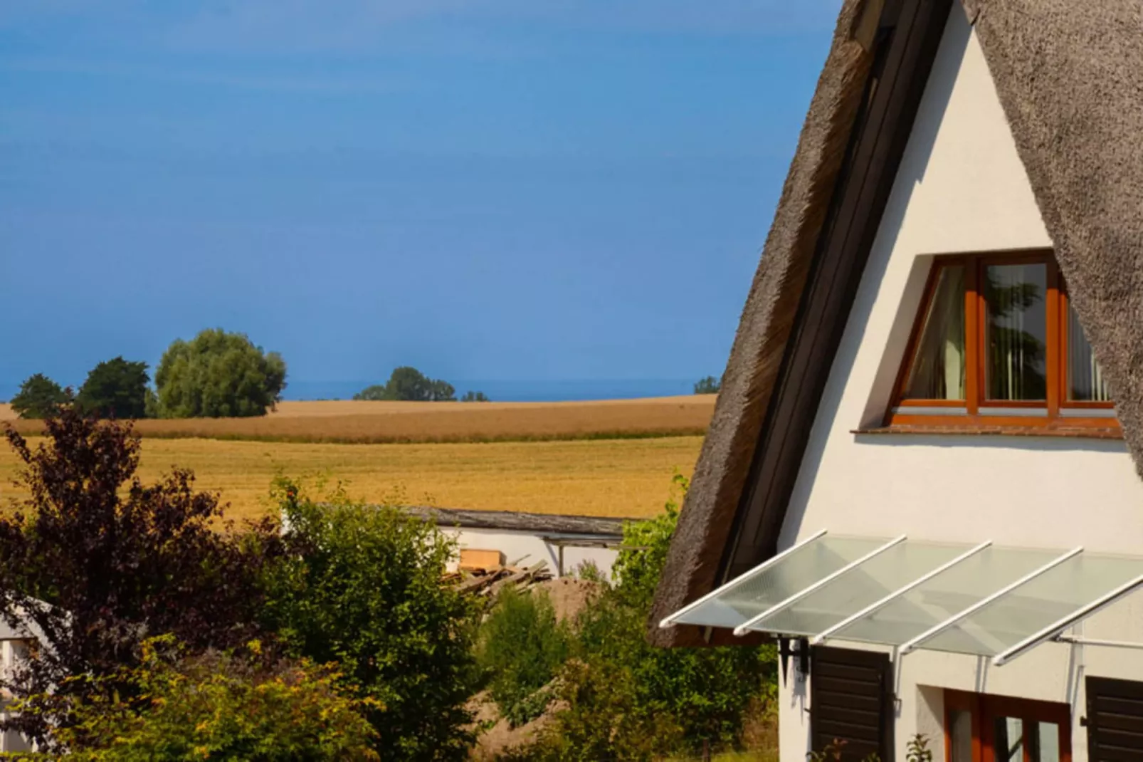 Ferienwohnung Eva mit Meerblick - strandnah - Sfeer