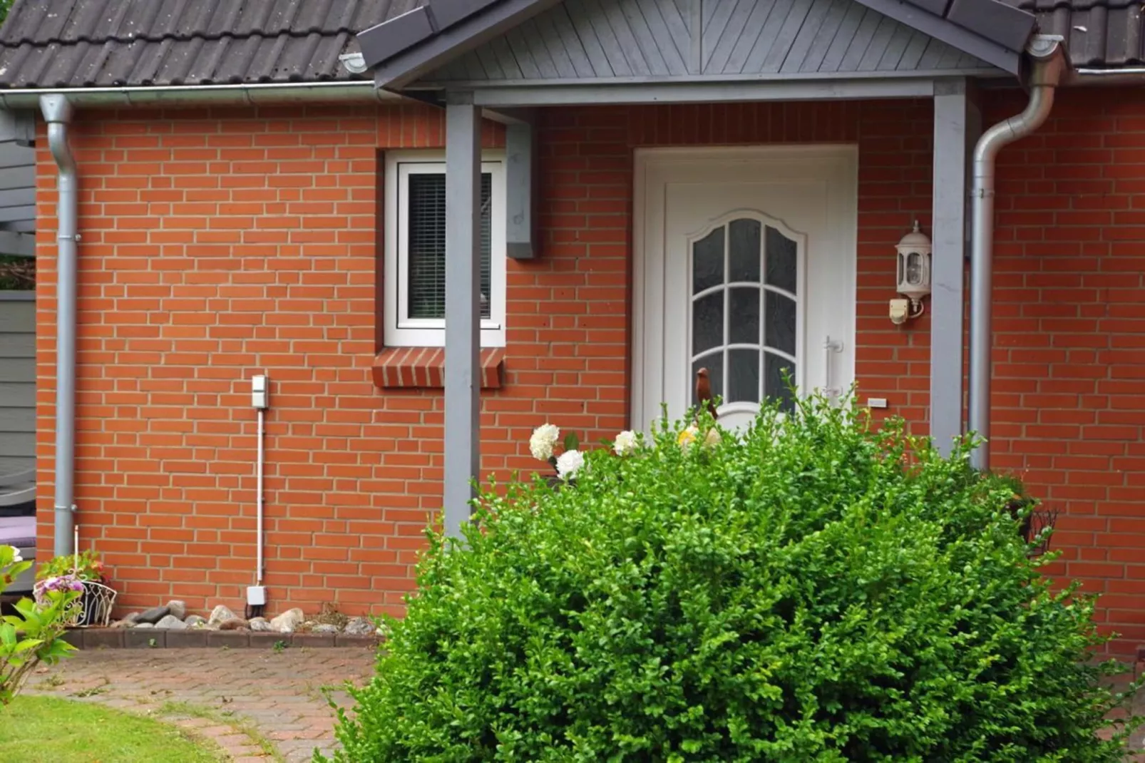 Niebüll-Ferienhaus Seebrise - Buitenkant zomer