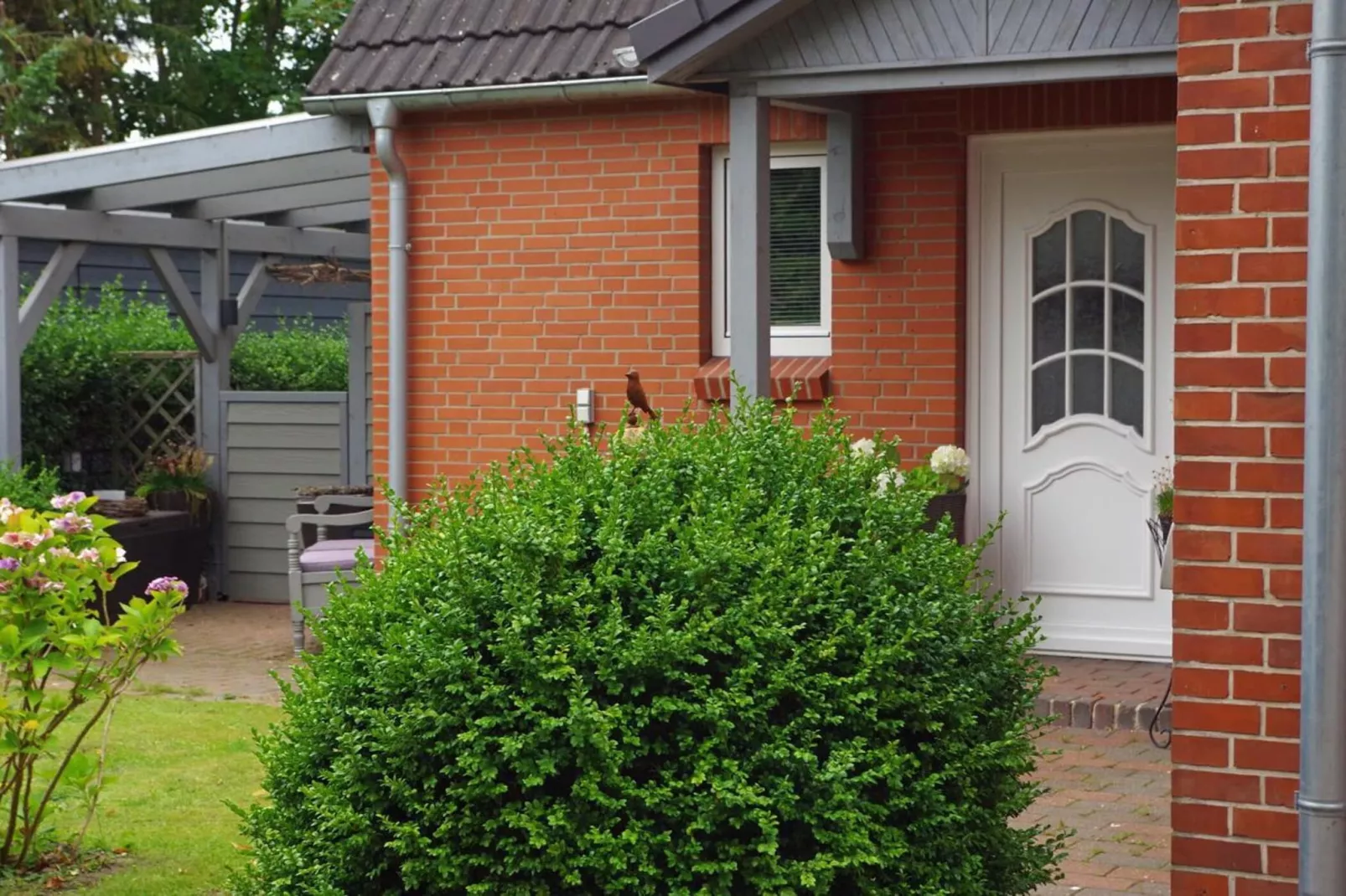 Niebüll-Ferienhaus Seebrise - Buitenkant zomer