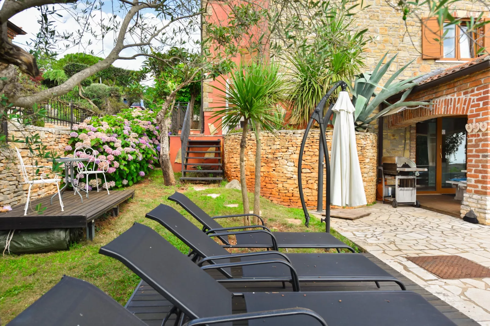 Villa Gloria-Tuinen zomer