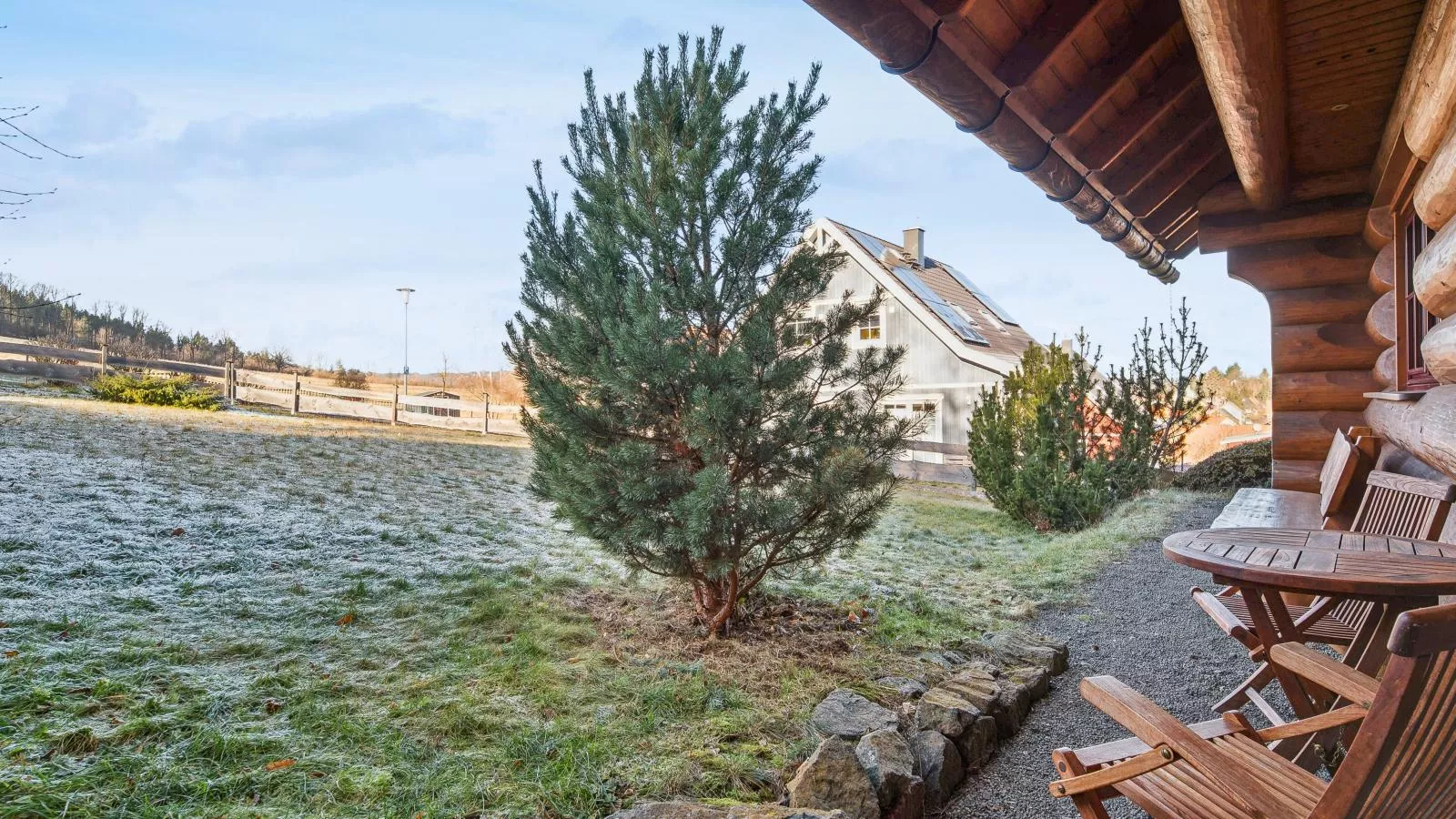 Naturstammhaus-Buitenlucht