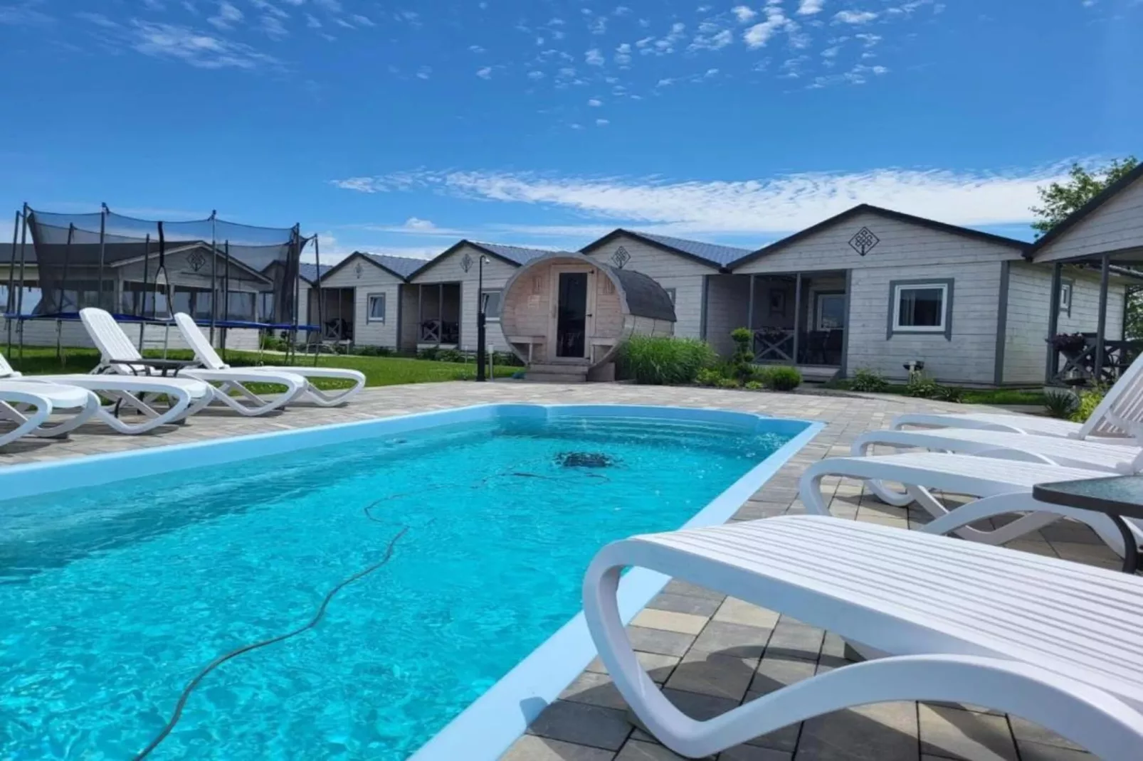 	Domki wakacyjne z basenem Gąski-Zwembad