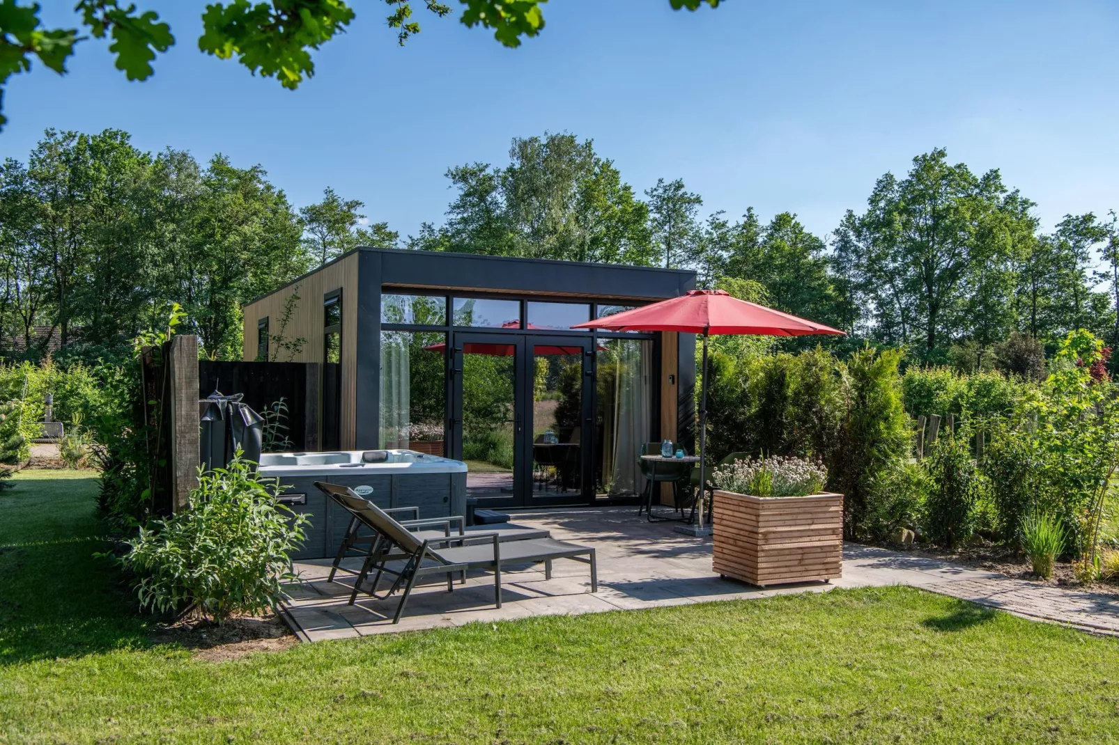 Wellnesslodge Specht 2p-Buitenkant zomer