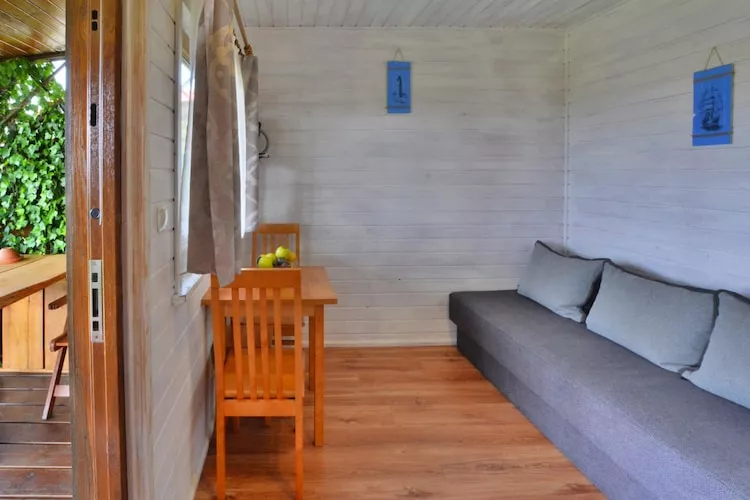 Parterowe domki wakacyjne dla max 3 osób w Bobolinie-Woonkamer