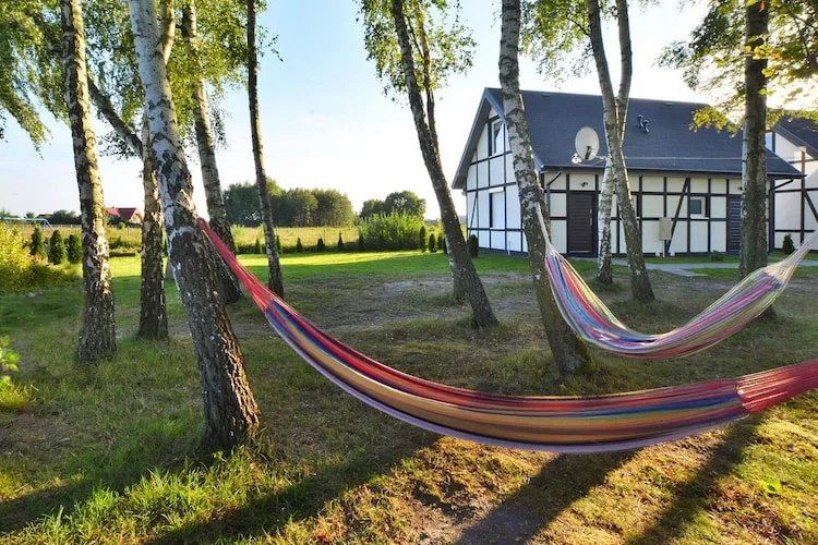 Piętrowy dom wakacyjny z tarasem 40 m2 dla 4 osób Jarosławiec-Buitenkant zomer