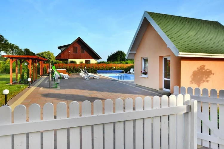 Domki wakacyjne z basenem i jacuzzi Osieki-Buitenkant zomer