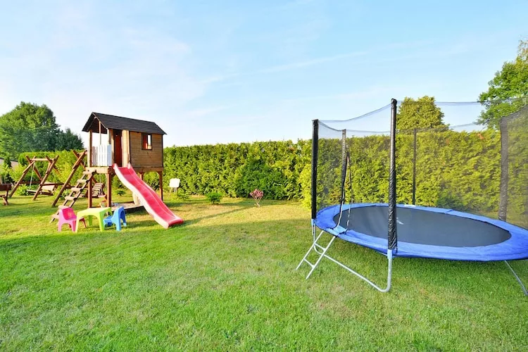 Domki wakacyjne z basenem i jacuzzi Osieki-Tuinen zomer