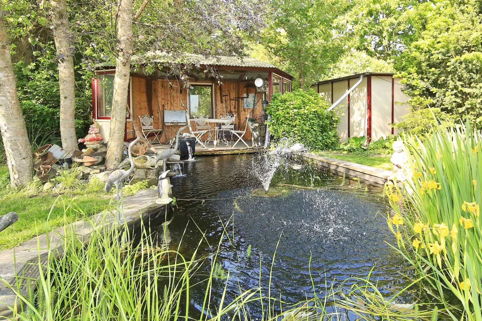 Karakteristiek landhuis met sauna-Tuinen zomer