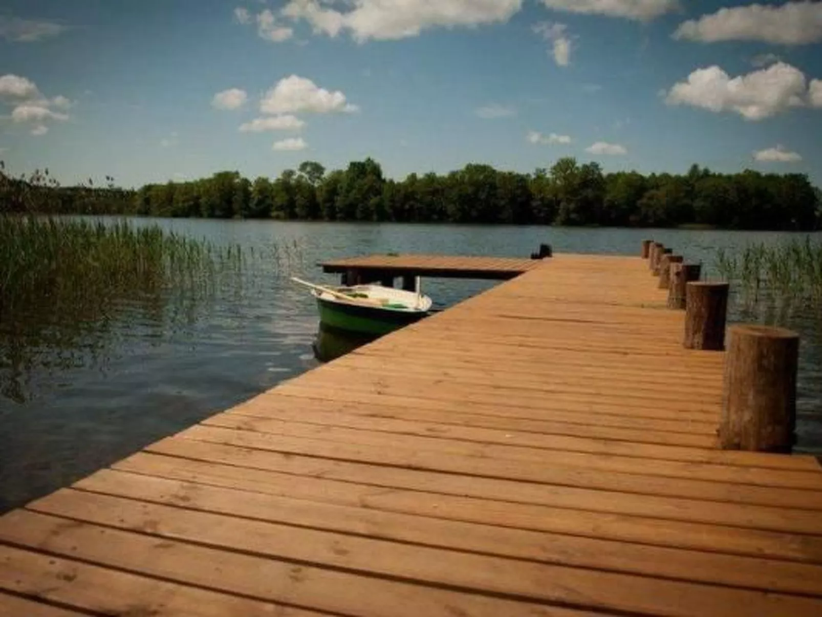 Zimmer mit Seeblick und Terrasse - Buiten
