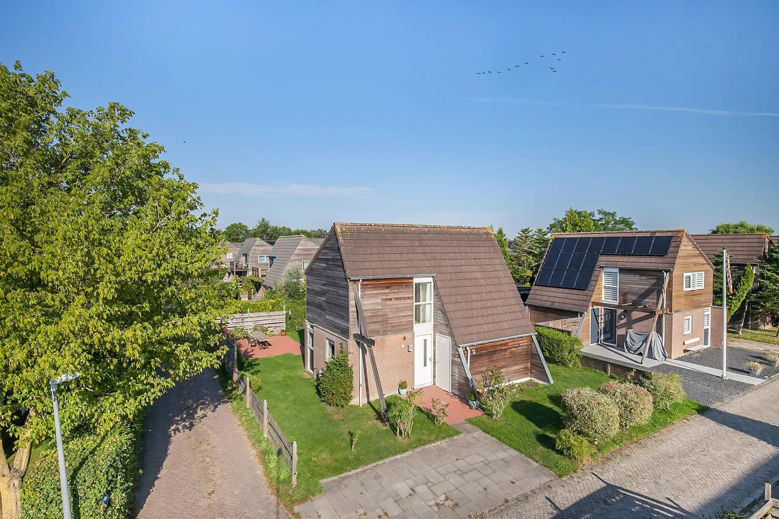 Combinatiewoningen Wolters - Buitenkant zomer