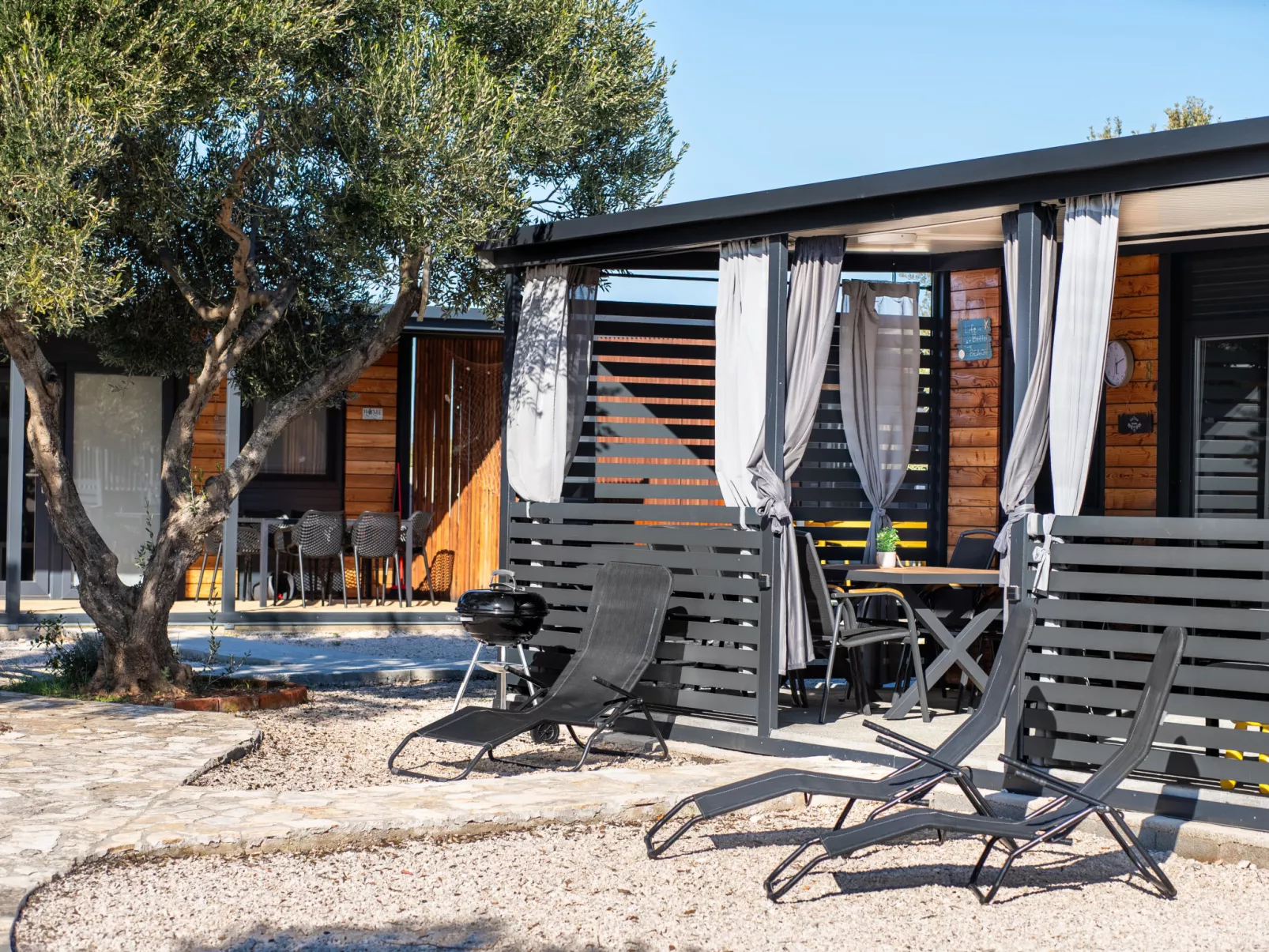 Maslina Delux - Buiten