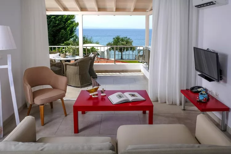 Holiday residence Acrotel Athena Villas, Elia Beach-Maisonette - Woonkamer