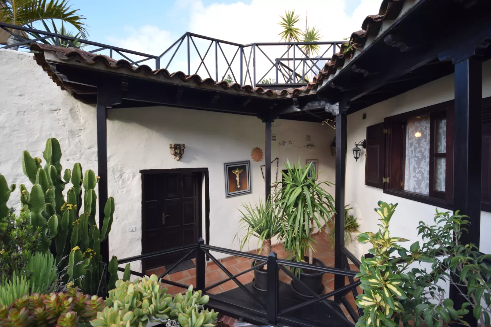 Apartamentos Monasterio de San Antonio 4 - Buitenkant zomer