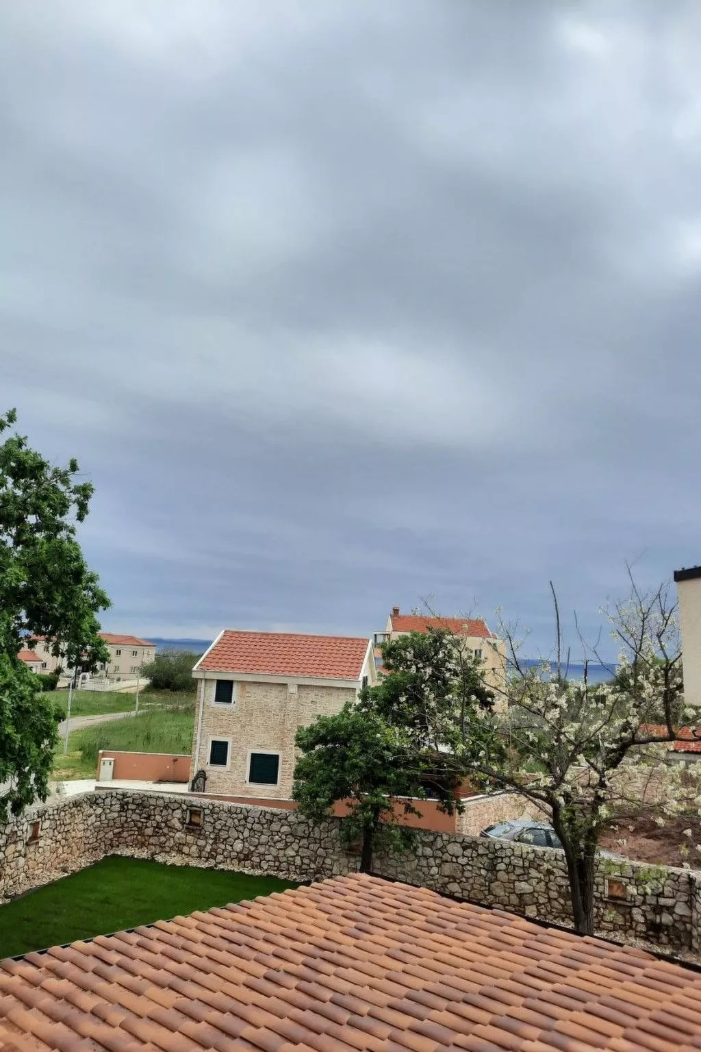 Gästezimmer "Rosa Zimmer" mit Balkon - Buiten