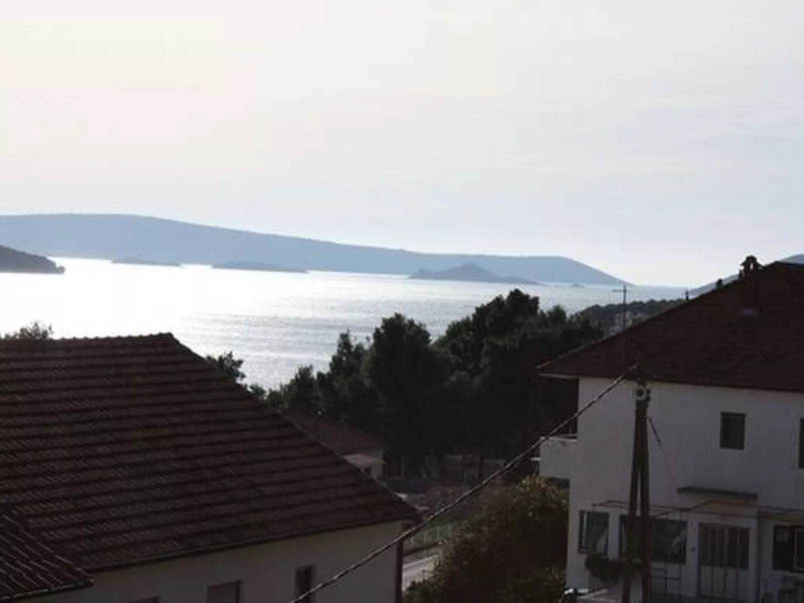 Erdgeschoss Doppelbettzimmer 25m² mit geräumiger Terrasse und Meerblick Villa M - Buiten