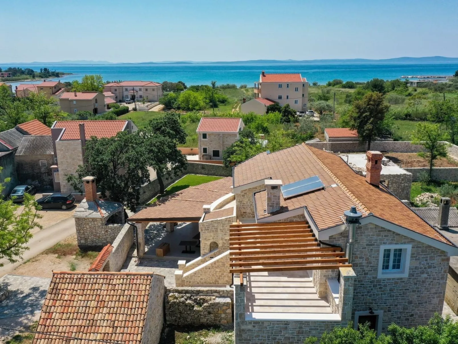 Zimmer "Graues Zimmer" mit privatem Balkon - Buiten