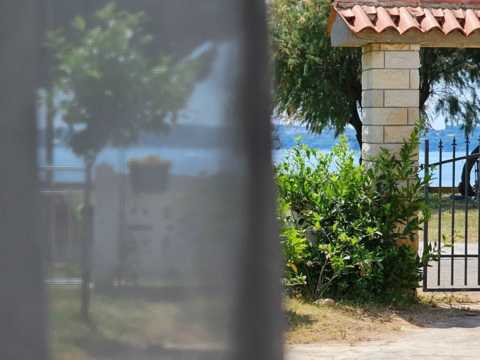 Wohnung "Pintar 1" mit Blick auf das Wasser - Buiten