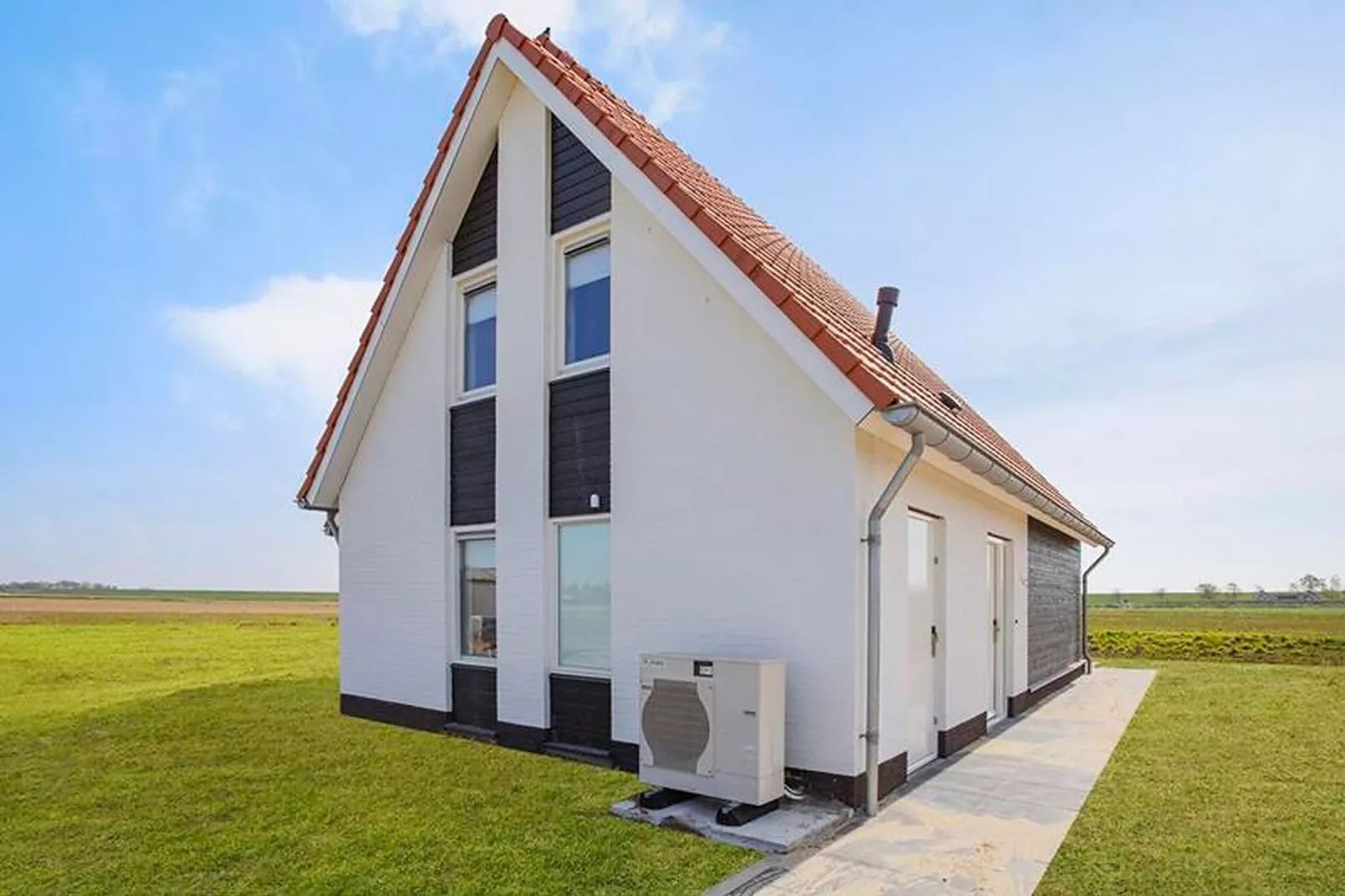 De Ooievaar Huis NR 23-Buitenkant zomer