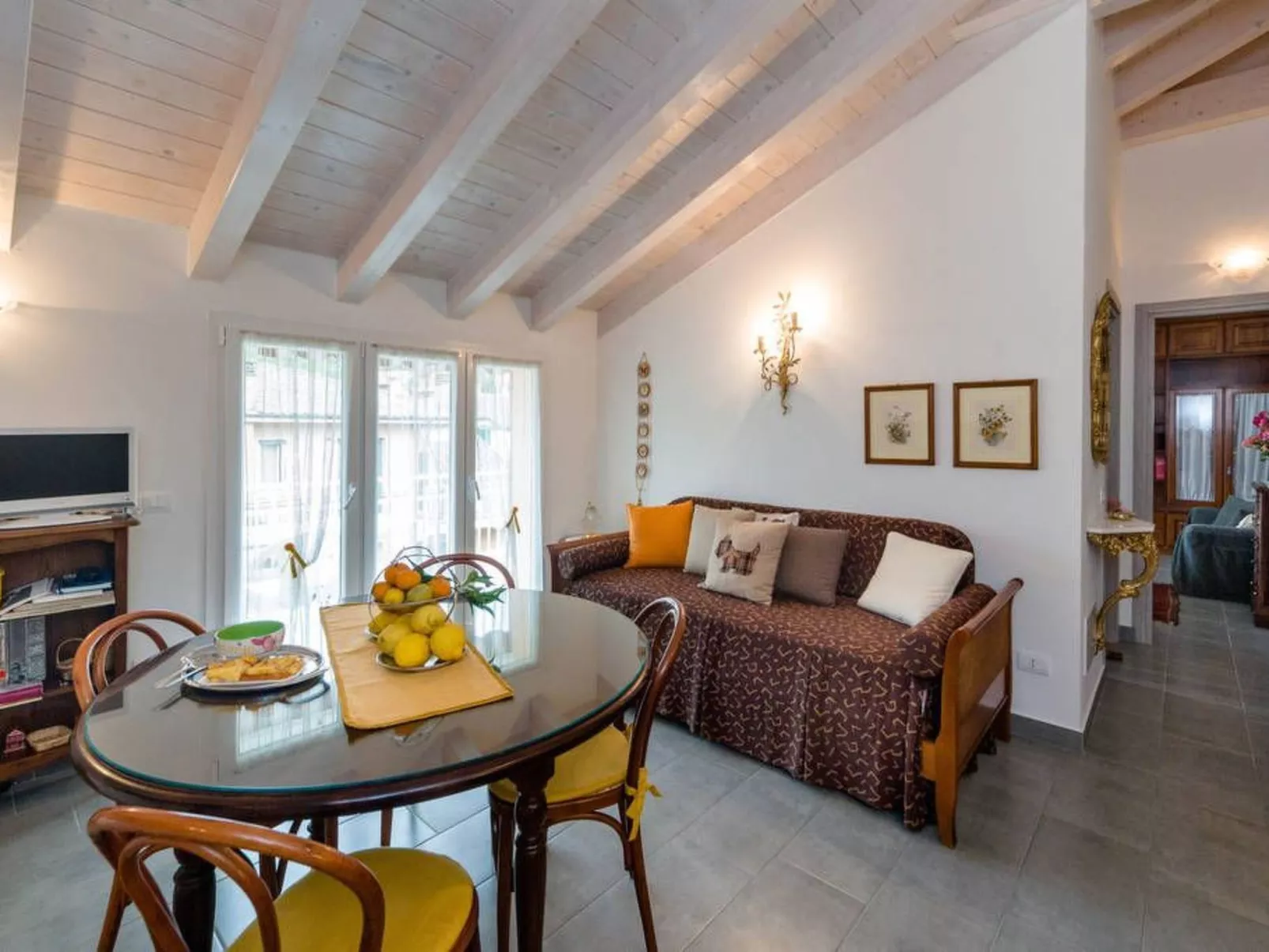 Ferienzimmer 'Mansarda Lina' mit Terrasse - Binnen