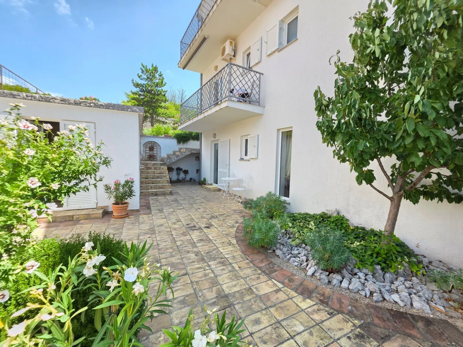 Zimmer für 2, mit Terrasse und Meerblick, ohne Küche - Buiten