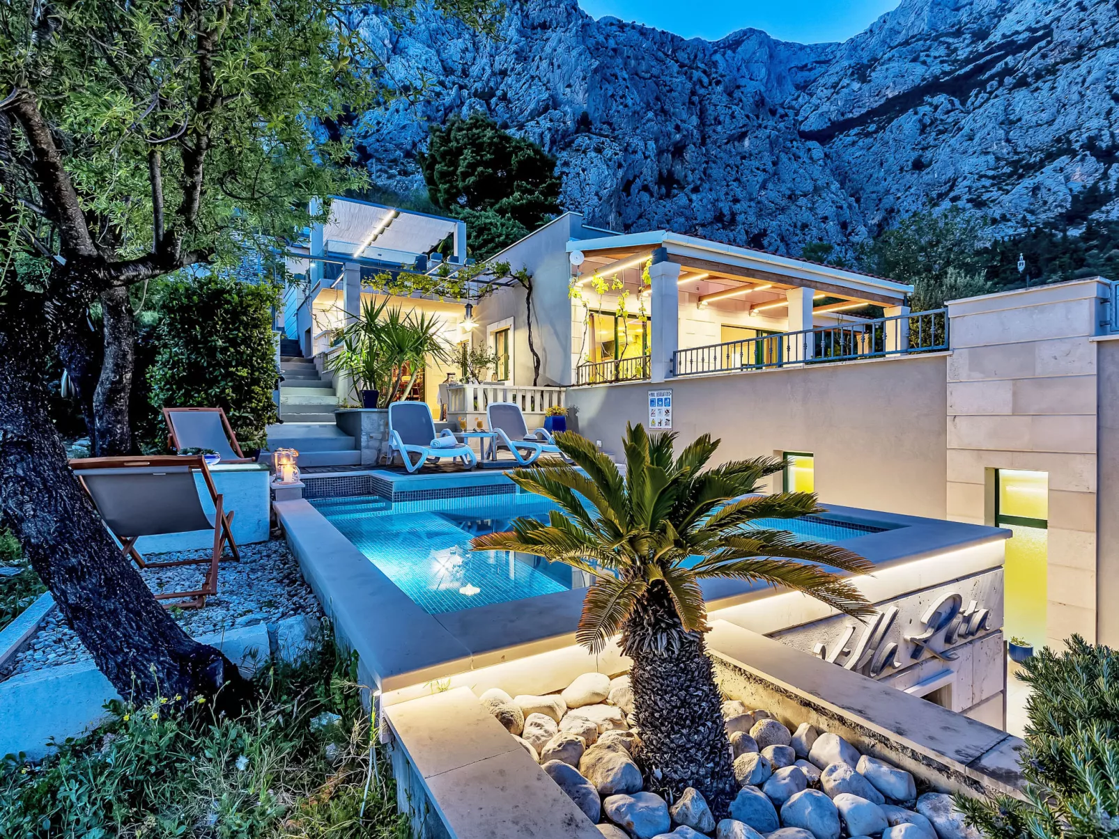 "Villa Rita" mit Blick auf das Wasser - Buiten