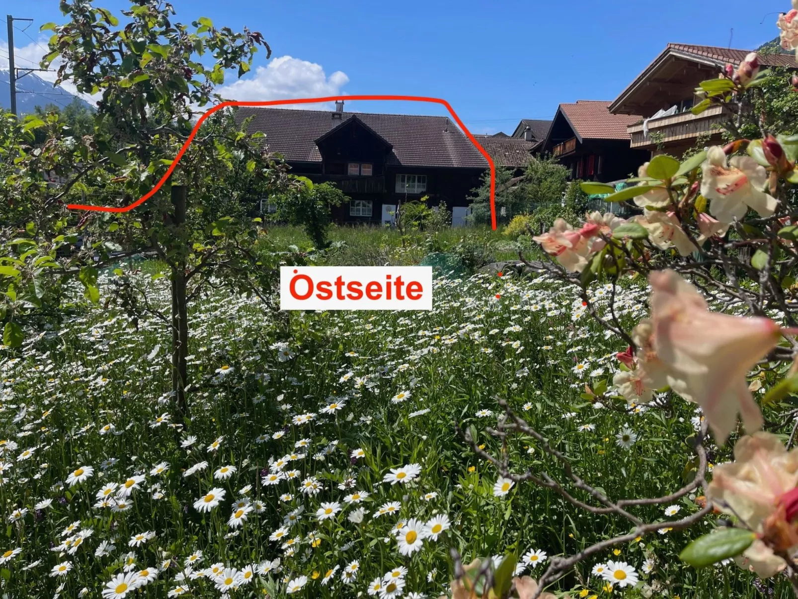 Chalet-Hausteil mit Garten im Dorfkern - Buiten