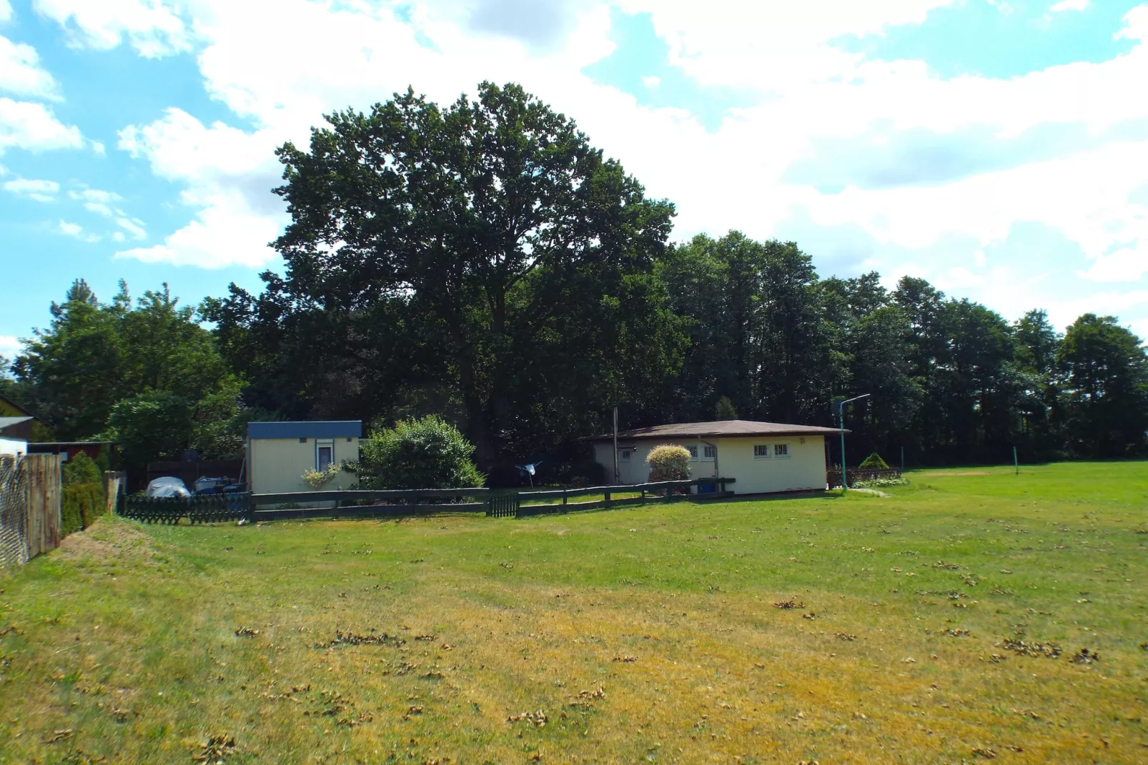 Bungalow Schlowe Unter d Eiche 4 P - Buitenkant zomer