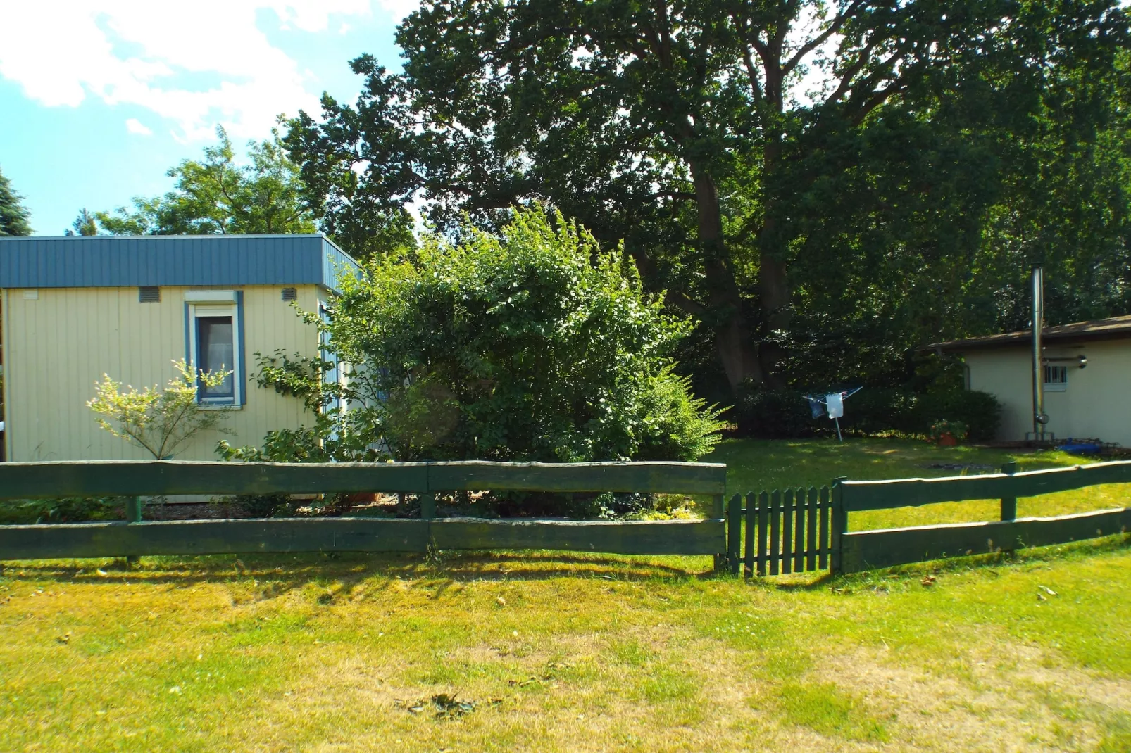 Bungalow Schlowe Am See 4 P - Buitenkant zomer