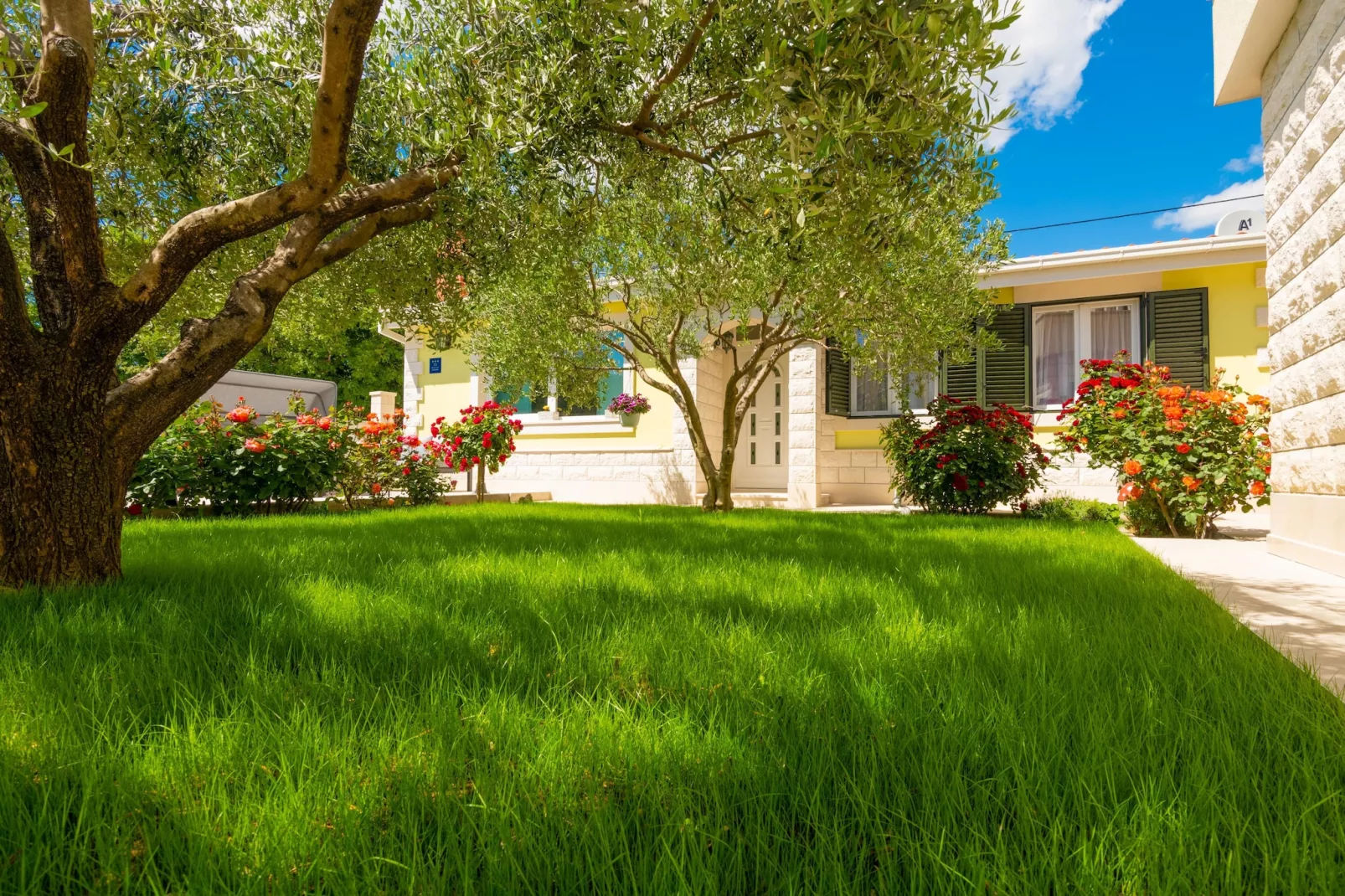 Holiday Home Maslina - Tuinen zomer