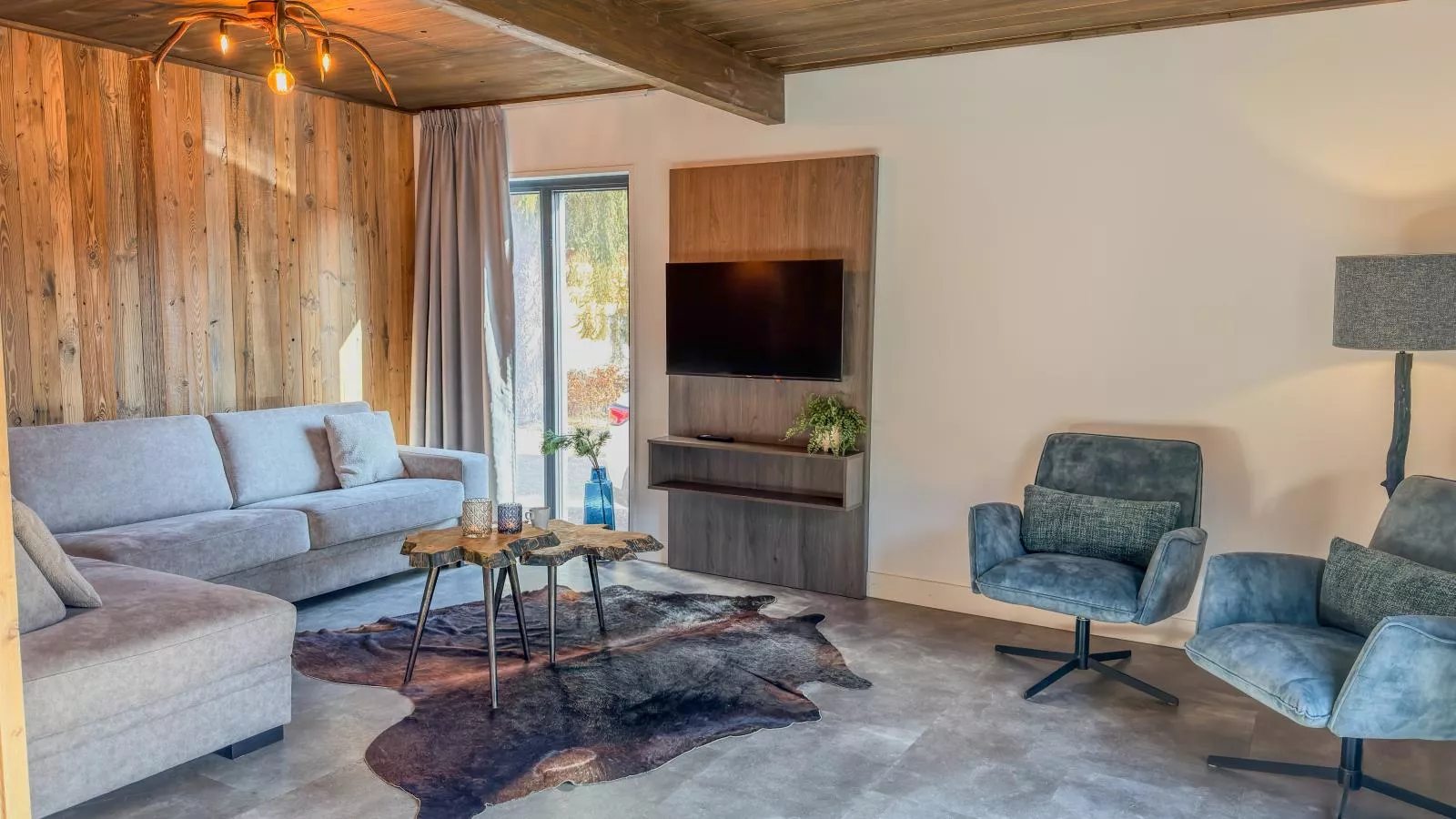 Alpenchalet Nockblick am Afritzer See - Woonkamer