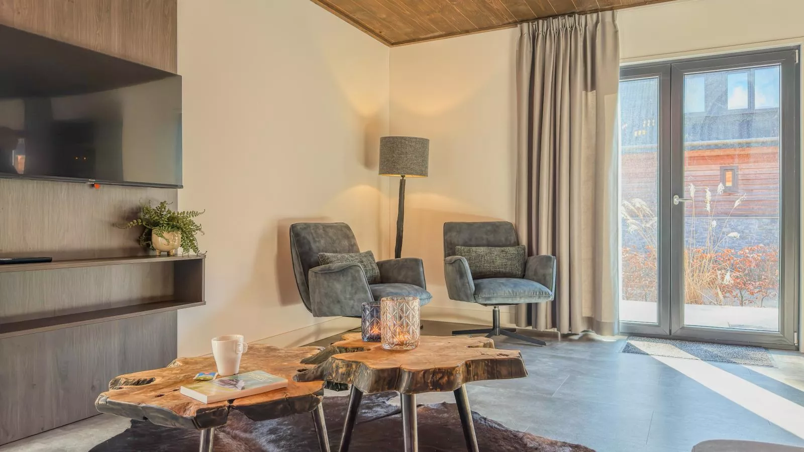 Alpenchalet Nockblick am Afritzer See - Woonkamer