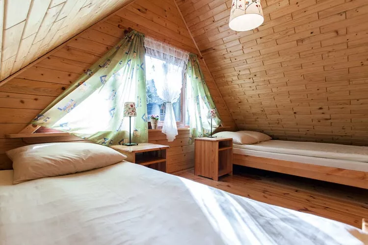 Drewniane domki wakacyjne Pobierowo-Slaapkamer