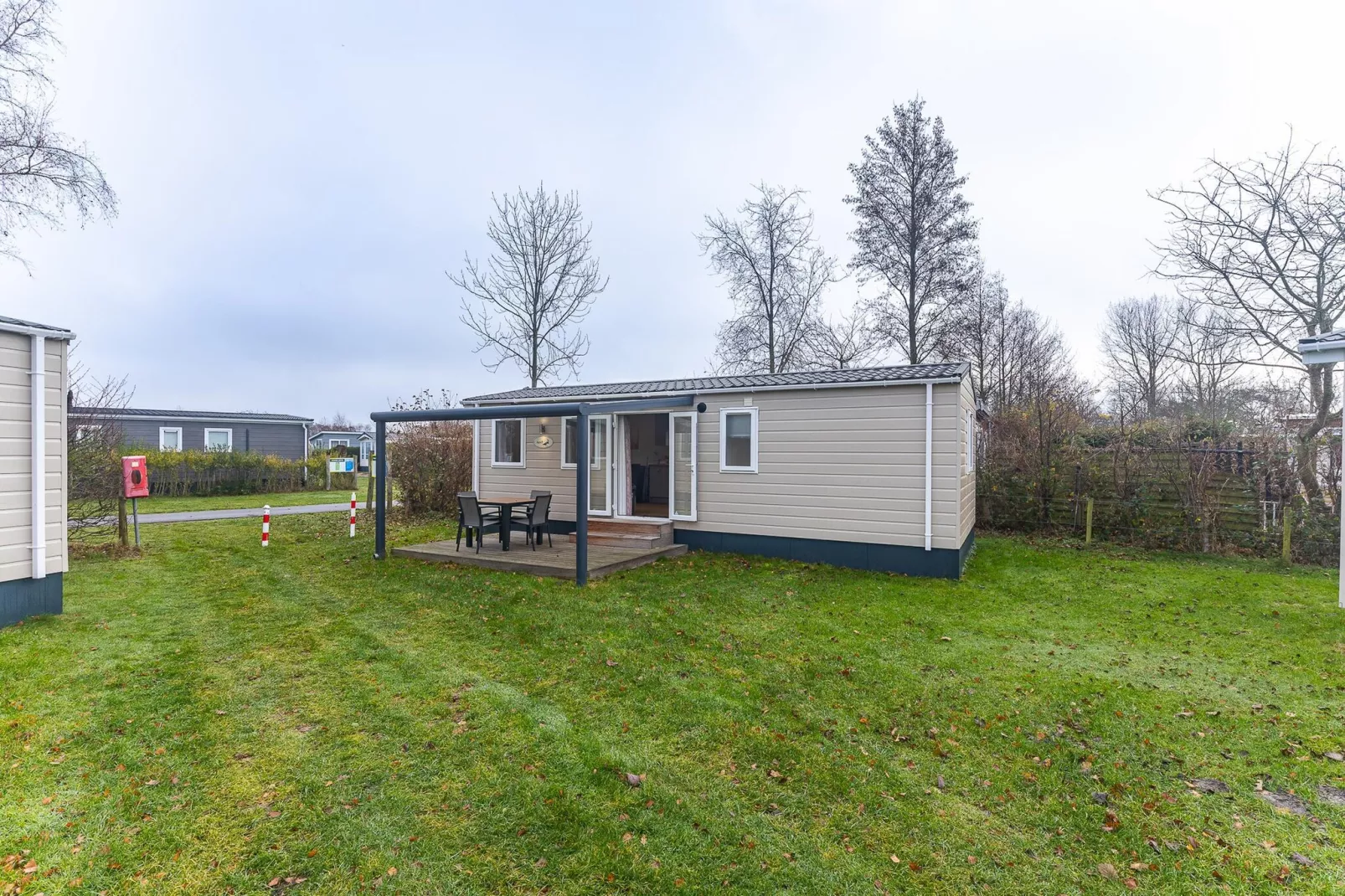 Duinhoeve Chalet Vogel - Huisdier niet toegestaan - Buitenkant zomer