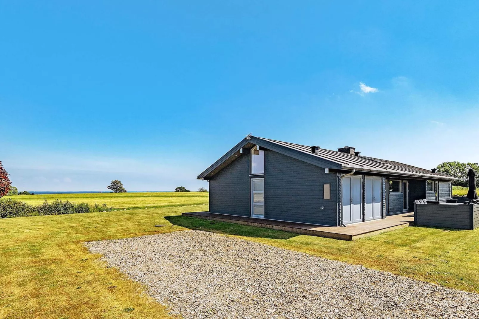 Vakantiehuis aan de kust met spa en sauna - Buitenlucht