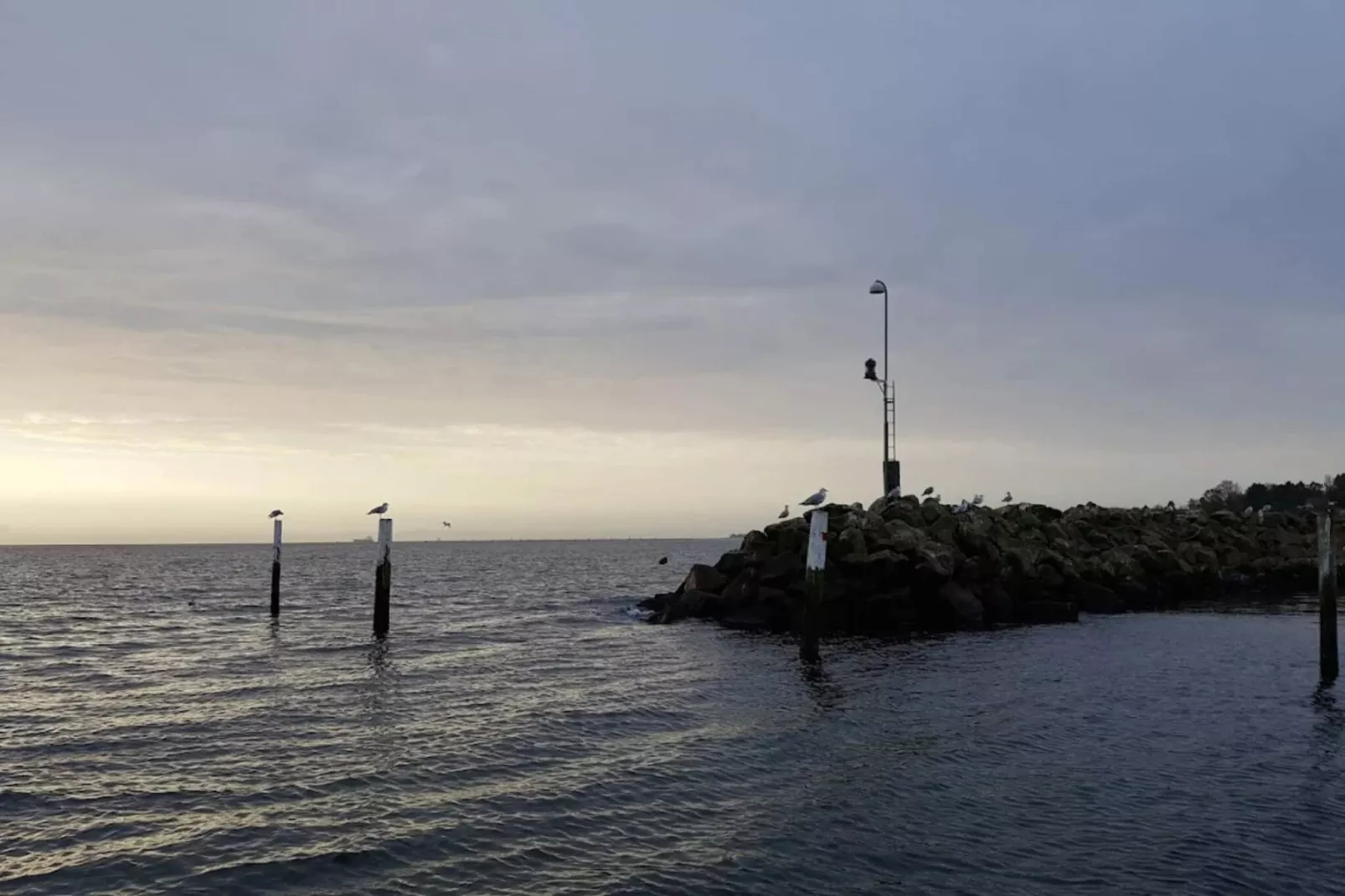 Vakantiehuis aan de kust met spa en sauna - Waterzicht