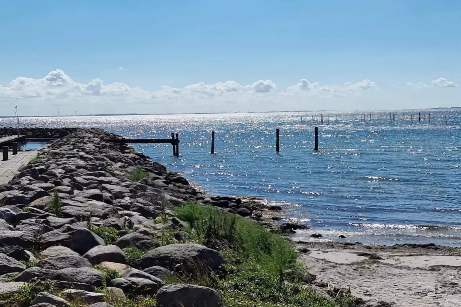 Vakantiehuis aan de kust met spa en sauna - Waterzicht