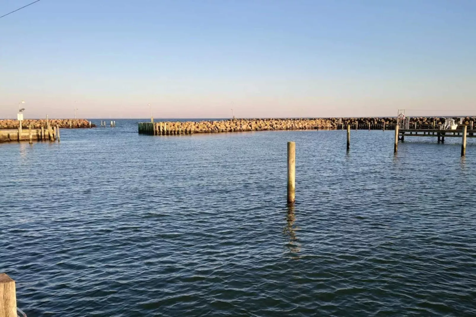 Vakantiehuis aan de kust met spa en sauna - Waterzicht