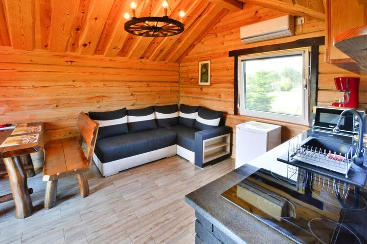 Kaktus Holiday resort sypialnia z sofami Osieki-Woonkamer