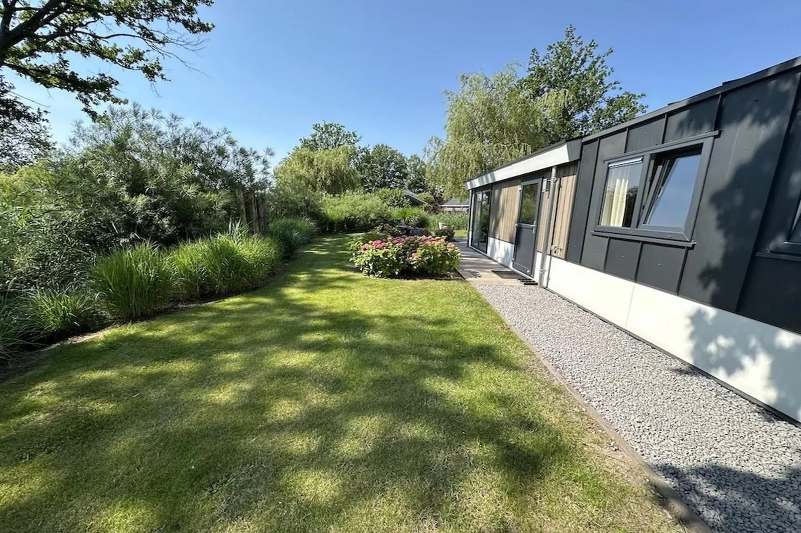 Hackfort kavel 143 - Buitenkant zomer