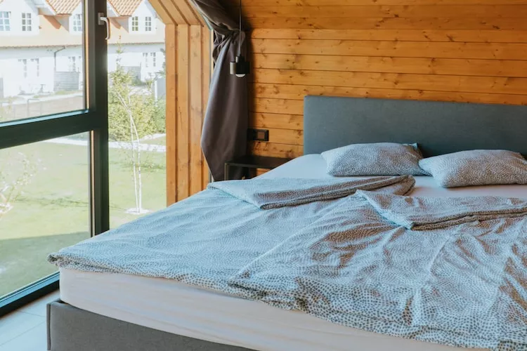 Domy wakacyjne i apartamenty w Niechorzu - Slaapkamer