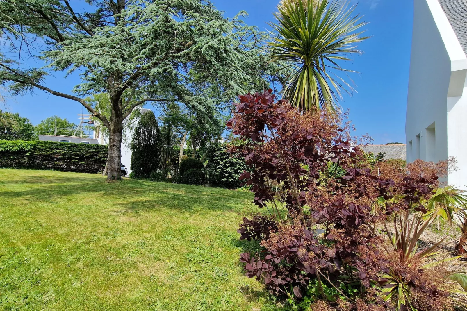 Holiday home in Locquirec - Tuinen zomer