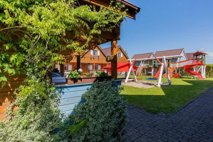 Domki wakacyjne w Rewalu - Tuinen zomer
