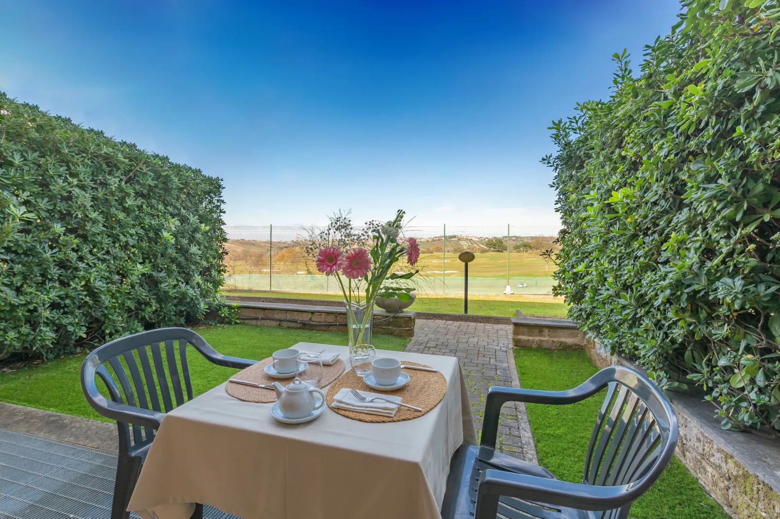 Bilocale vista giardino 105- 3 pax - Terrasbalkon