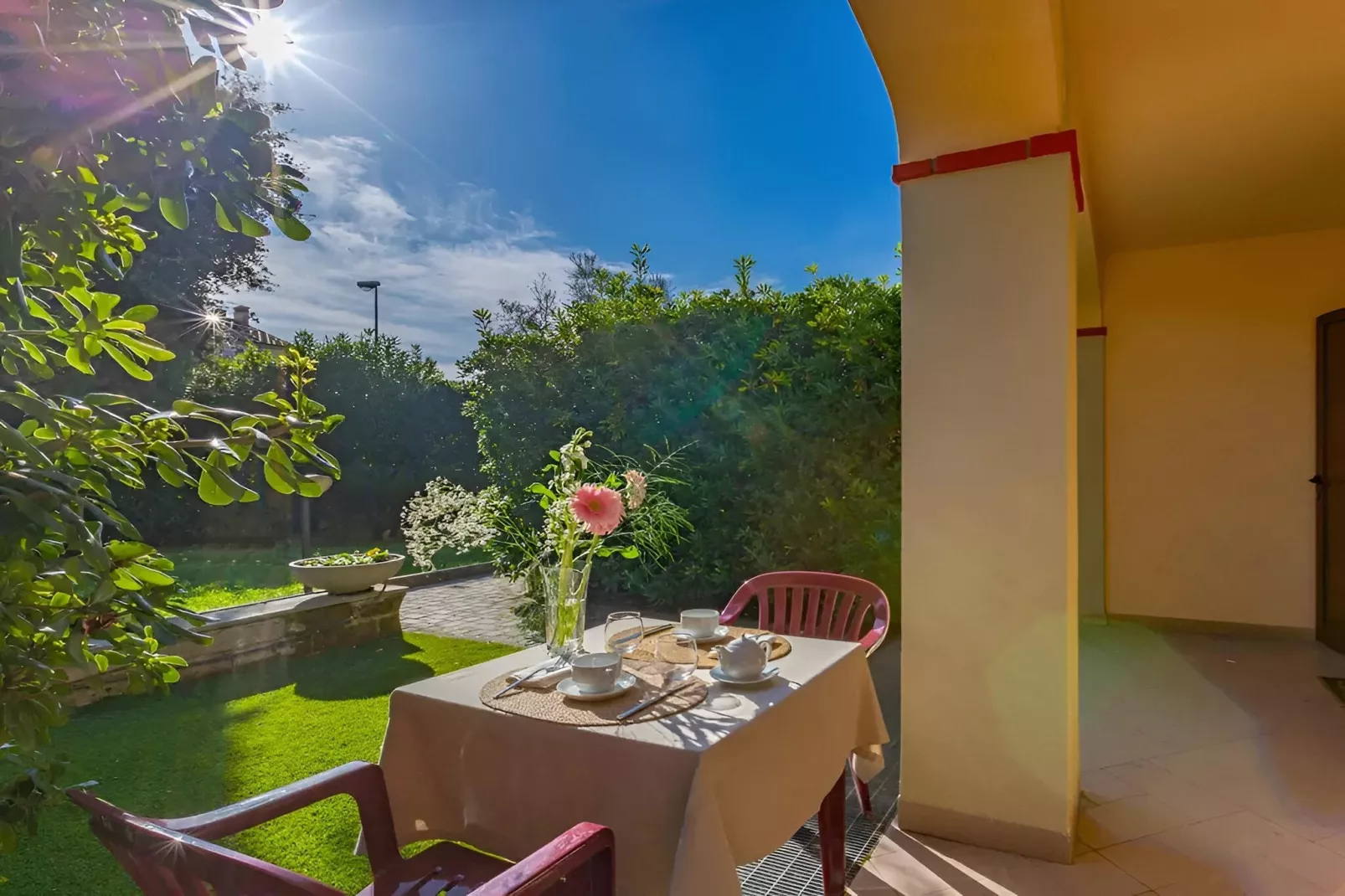 Bilocale vista giardino 105- 2 pax - Terrasbalkon